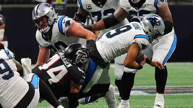 Falcons linebacker Troy Andersen sacks Carolina Panthers quarterback Bryce Young in Week 1, 2023.